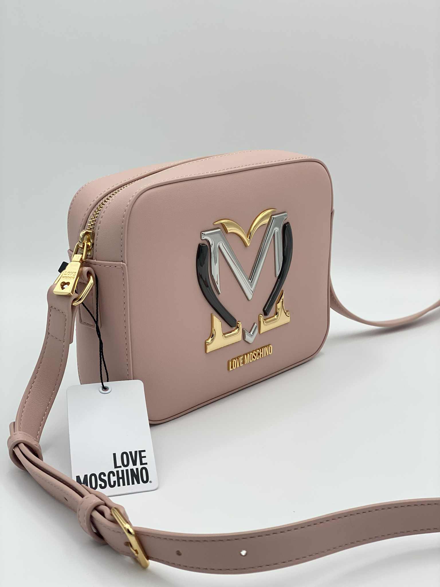 Crossbody bag in faux leather with metal logo