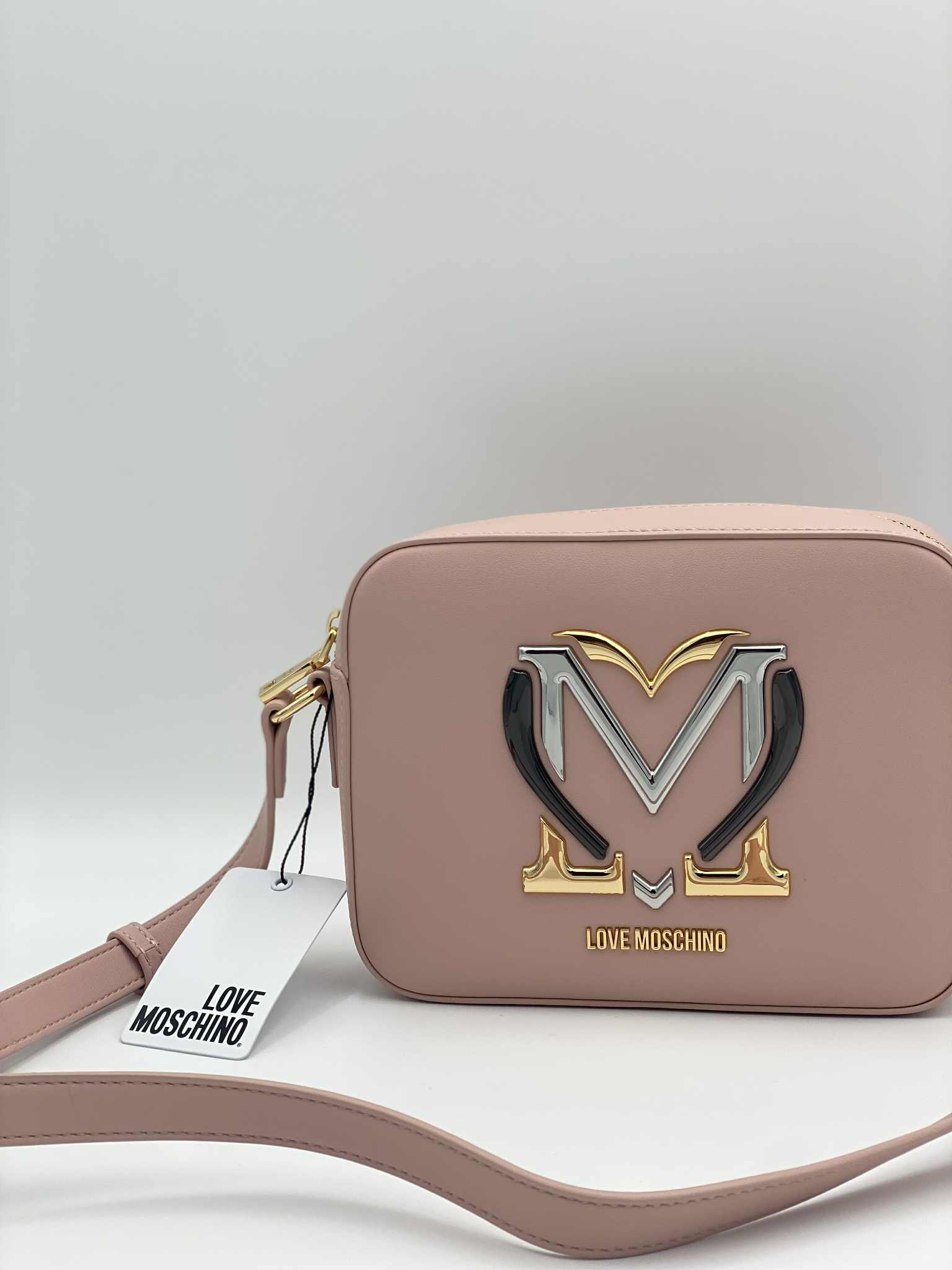 Crossbody bag in faux leather with metal logo