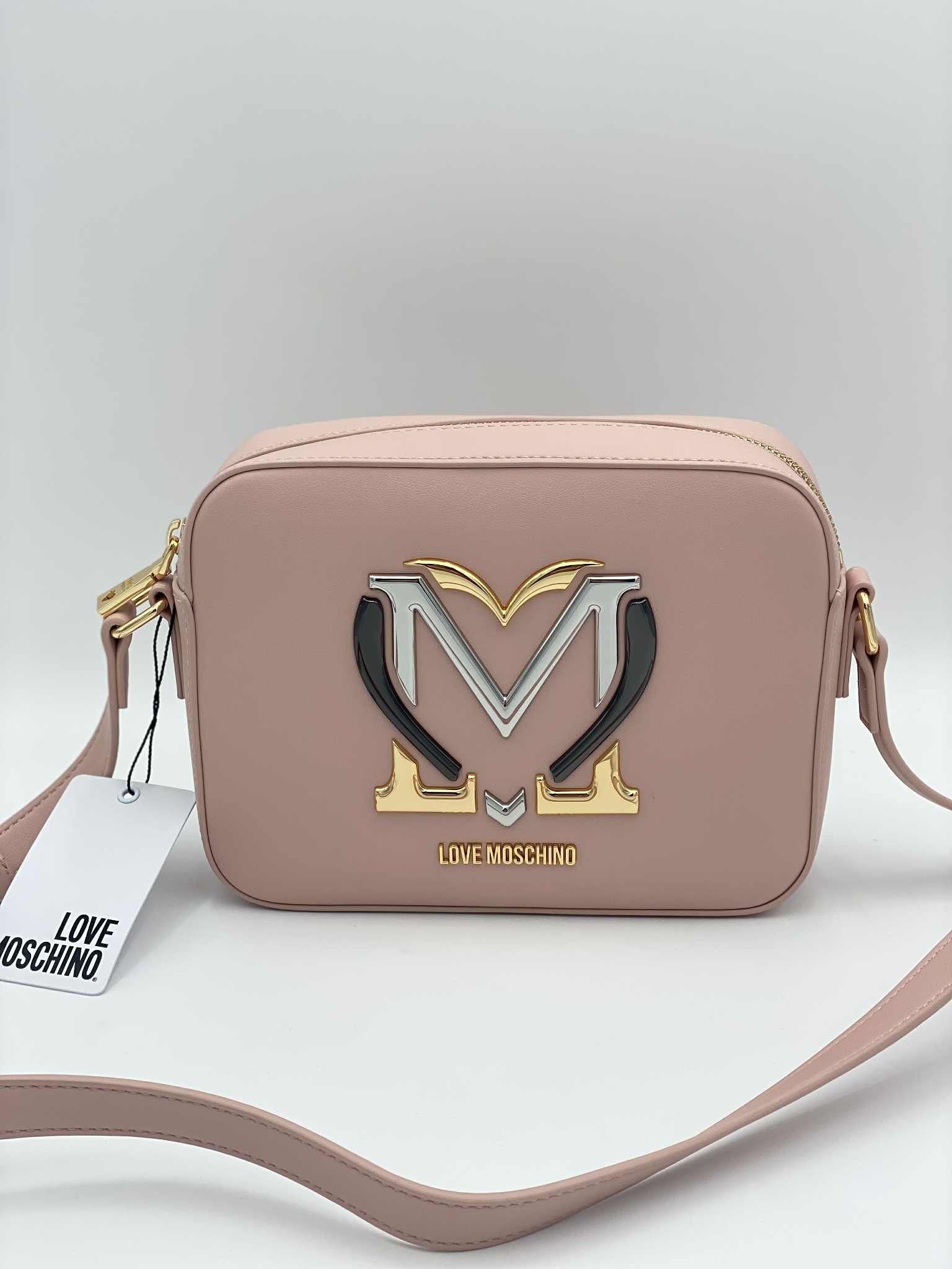 Crossbody bag in faux leather with metal logo