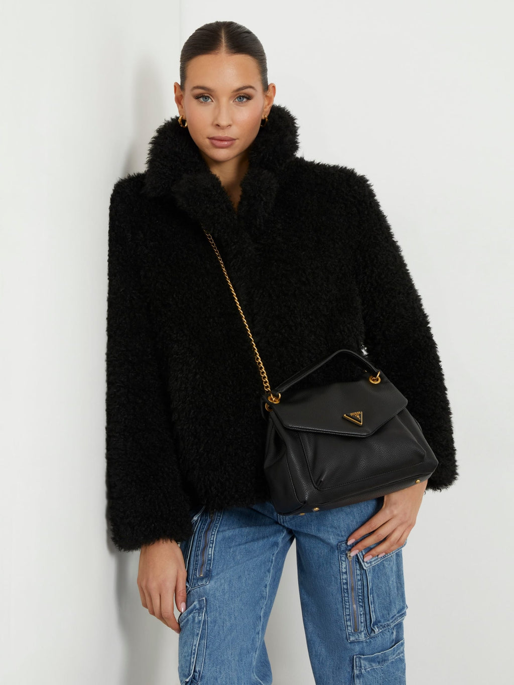 Laryn triangle logo crossbody bag