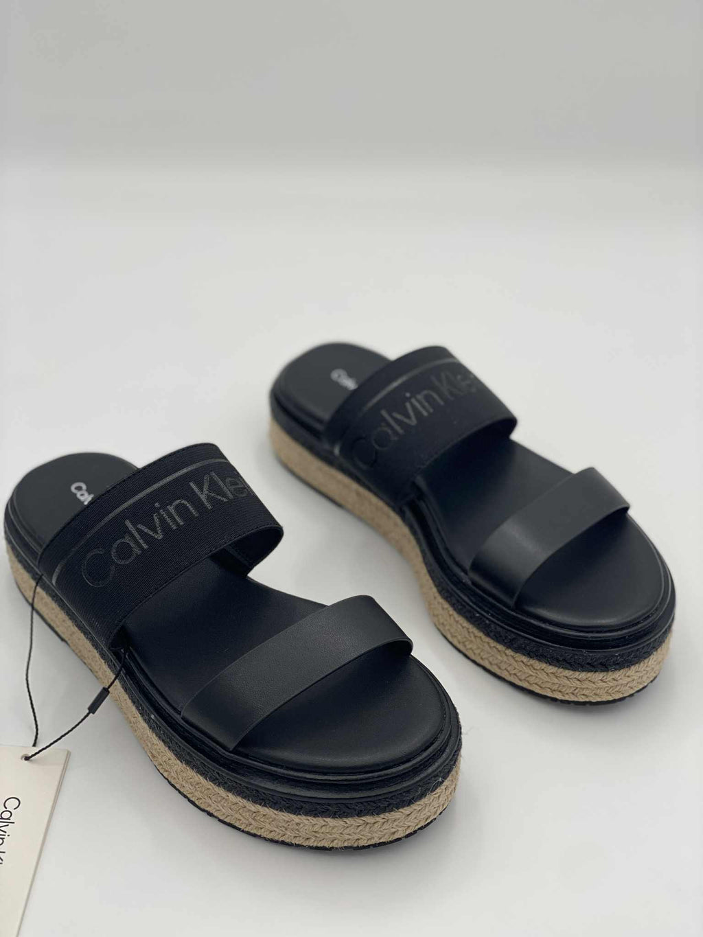 Flatform leather slippers with plain pattern