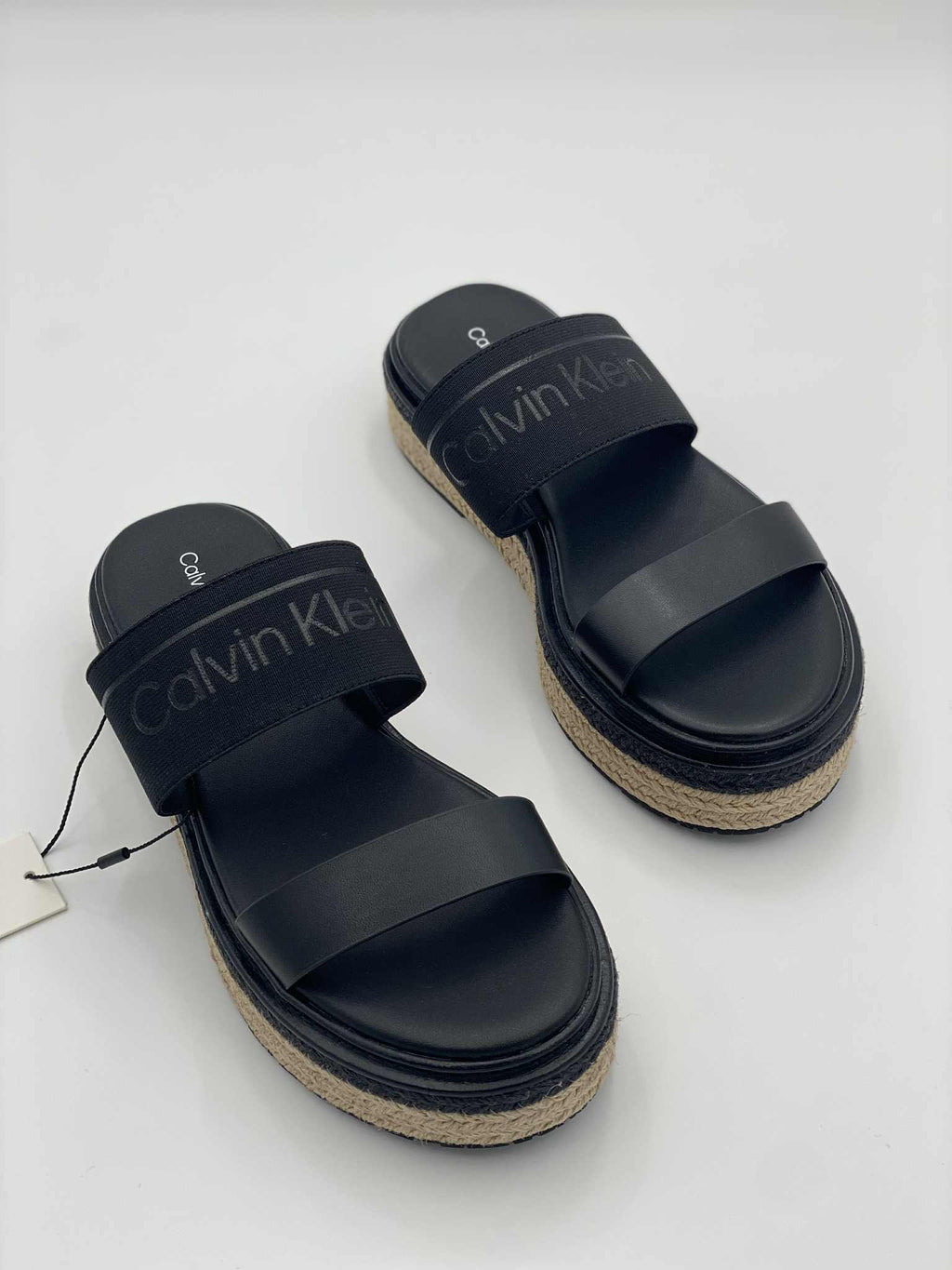 Flatform leather slippers with plain pattern