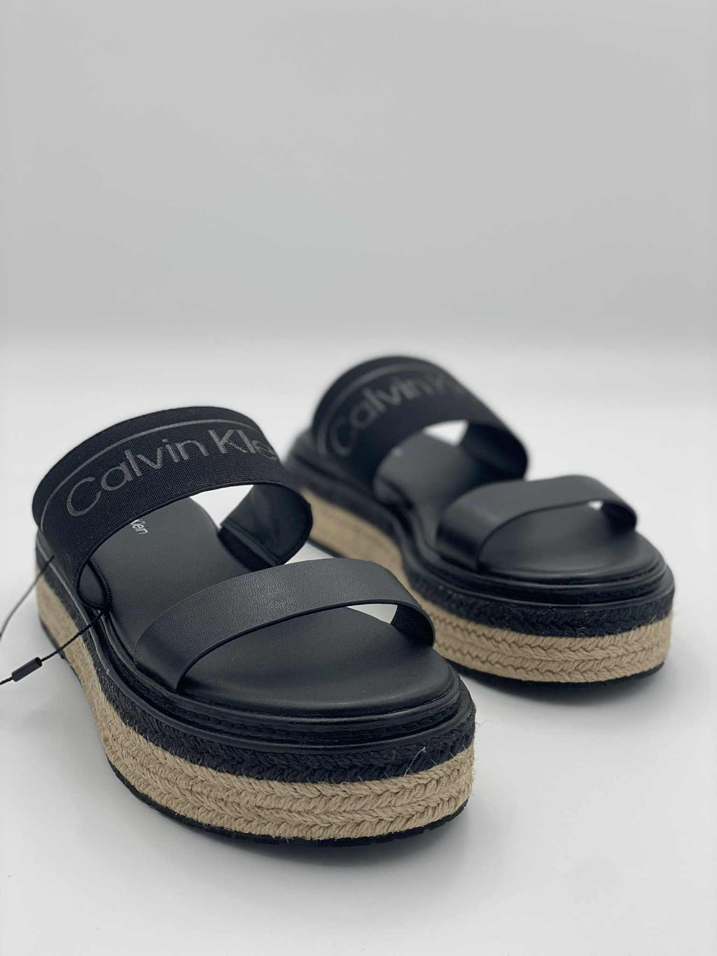 Flatform leather slippers with plain pattern